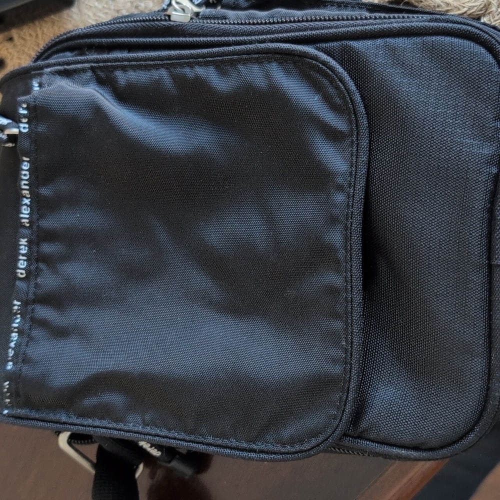Derick Alexandra Black Messenger Bag.